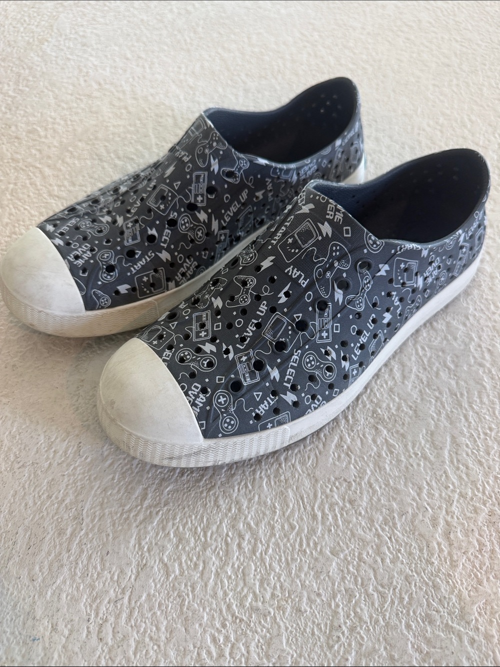 Native Shoes Kids Black Graphic Slip-On Sneakers with White Toecap